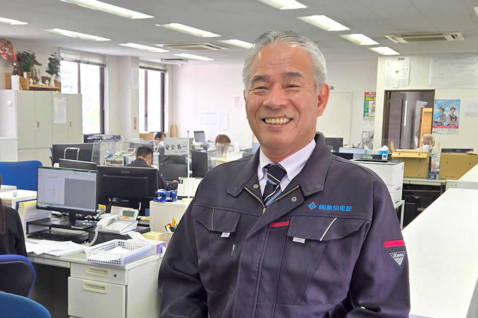 写真：代表取締役社長　岡田　亀彦